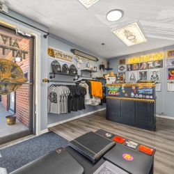 Aion Tattoo - Merchandise shop and waiting area