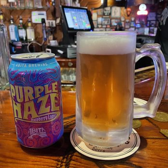 The Watering Hole Saloon - a beer and a can of purple haze - Sports Bars Near Me - New Braunfels, Texas The Watering Hole Saloon - a beer and a can of purple haze - Sports Bars Near Me - New Braunfels, Texas