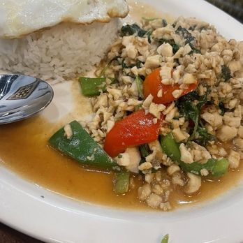 Just Thai - Kapow pork... with sunny side up eggs on top of rice - Thai Near Me - Deerfield Beach, Florida Just Thai - Kapow pork... with sunny side up eggs on top of rice - Thai Near Me - Deerfield Beach, Florida