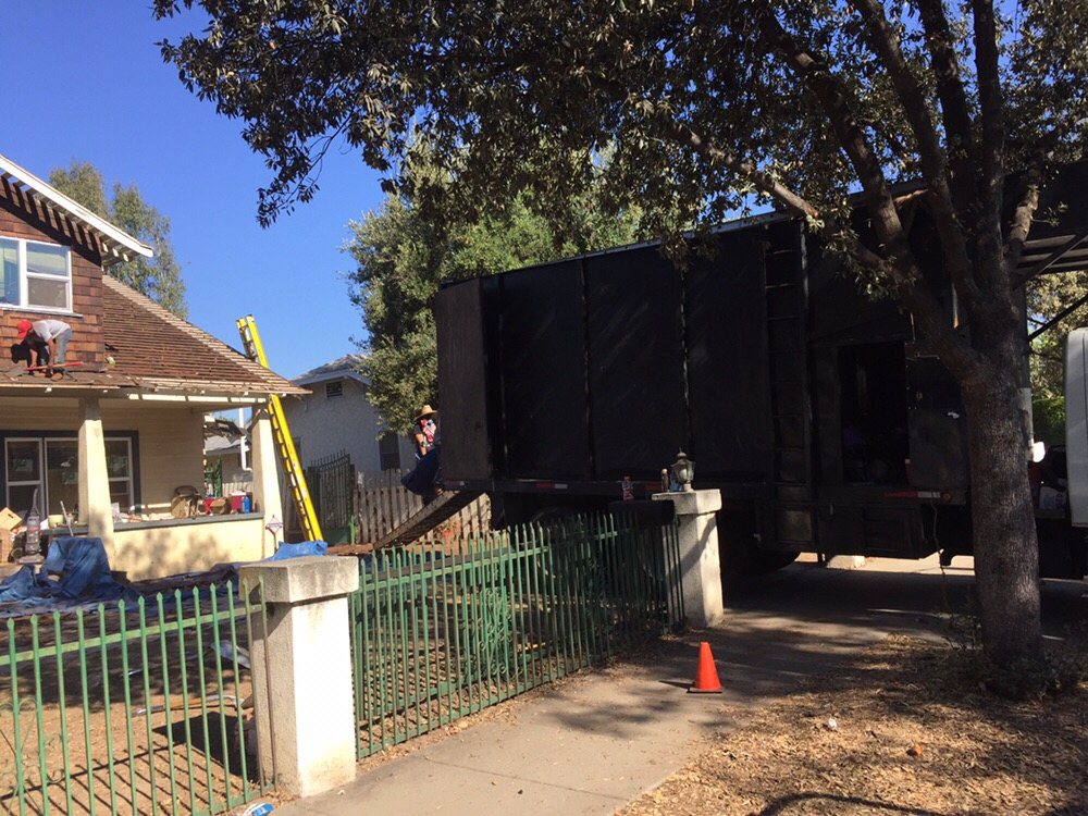 Slide of H&M ROOFING