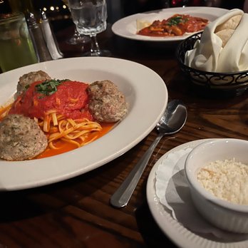 Primavista - Spaghetti and Veal meatballs with tomato basil sauce (front) and Ravioli with sausage, mushrooms, and tomato basils sauce (back) - Italian Near Me - Cincinnati, Ohio Primavista - Spaghetti and Veal meatballs with tomato basil sauce (front) and Ravioli with sausage, mushrooms, and tomato basils sauce (back) - Italian Near Me - Cincinnati, Ohio