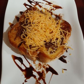 Awang Kitchen - Roti bakar dessert - like a grilled cheese sandwich meets a banana split. Not terrible, but probably won't get this again. - Indonesian Near Me - Elmhurst, New York