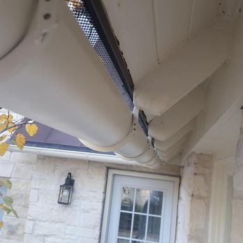 AQ Exteriors - half round gutter with side mount rafter brackets - Gutter Services Near Me