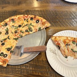 Goodfellas Pizzeria - Black olive and basil pizza.