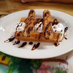 The churro was delicious. Stuffed with cream cheese and fried.