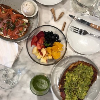 Mr West Cafe Bar Downtown - House - Cured Salmon avocado toast and fresh fruits - Bars Near Me - Seattle, Washington Mr West Cafe Bar Downtown - House - Cured Salmon avocado toast and fresh fruits - Bars Near Me - Seattle, Washington