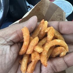Arby's - Broken pieces of curly fries dancing in my hand