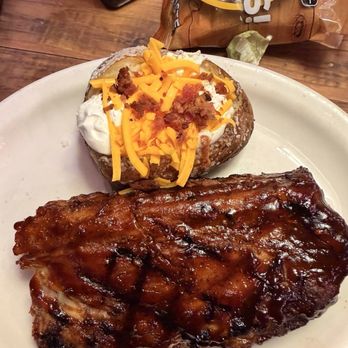 Texas Roadhouse - 1)2 rack of ribs and a loaded baked potato - Barbeque Near Me - Weatherford, Texas Texas Roadhouse - 1)2 rack of ribs and a loaded baked potato - Barbeque Near Me - Weatherford, Texas