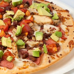 Dean's Pizza - The Avocado Club- Seasoned chicken, crumbled bacon, ham, tomatoes and fresh avocado with our white sauce