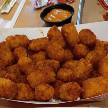 Herby's Burgers - Full size order seasoned Tater Tots (with a few already removed!!) $5 Sriracha and Mayo side sauce - Burgers Near Me - Dallas, Texas Herby's Burgers - Full size order seasoned Tater Tots (with a few already removed!!) $5 Sriracha and Mayo side sauce - Burgers Near Me - Dallas, Texas