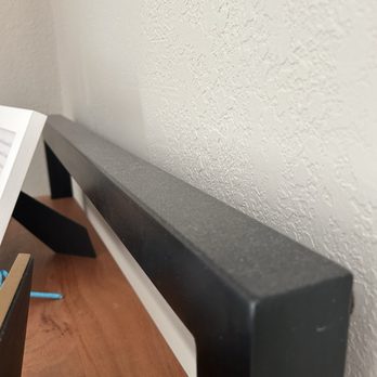 Daisy Maids Cleaning Solutions - Dust on shelf unit. - Home Cleaning Near Me Daisy Maids Cleaning Solutions - Dust on shelf unit. - Home Cleaning Near Me