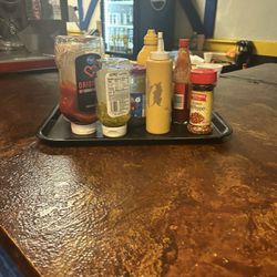 Glenwood Roller Rink - These are condiments that they expect us to use. It is also shared so everyone in the establishment has to use them.
