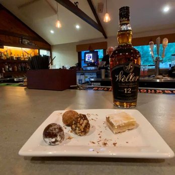Cabby's Grill & Patio - a plate of donuts and a bottle of whiskey - American Near Me - Fox Lake, Wisconsin