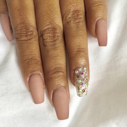 $40 Acrylic, matte, plus $5 for diamond on two fingers.