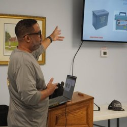 Atlanta Firearms Training - Firearms instructor teaching how to safely store ammunition