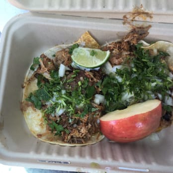 Mora Taco Truck - Two carnitas tacos. Yum yum!! Thanks for the apple Carlos! - Food Trucks Near Me - San Francisco, California Mora Taco Truck - Two carnitas tacos. Yum yum!! Thanks for the apple Carlos! - Food Trucks Near Me - San Francisco, California