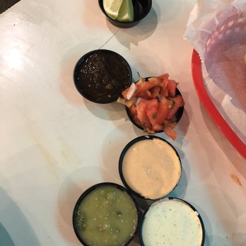 The Taco Stand - From bottom to top: Cilantro aioli, tomatillo salsa, chipotle mayo, pico, and salsa negra. All were really good. - Mexican Near Me - Miami, Florida The Taco Stand - From bottom to top: Cilantro aioli, tomatillo salsa, chipotle mayo, pico, and salsa negra. All were really good. - Mexican Near Me - Miami, Florida