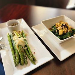 Ranazul - Sauteed asparagus with shaved Parmesan and anchovy butter, and Espinaca Catalan sauteed spinach with pine nuts, apples, raisins, and garlic.