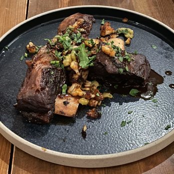 The Bison Restaurant - Bison short rib ($49.00) - Canadian (New) Near Me - Banff, Alberta The Bison Restaurant - Bison short rib ($49.00) - Canadian (New) Near Me - Banff, Alberta