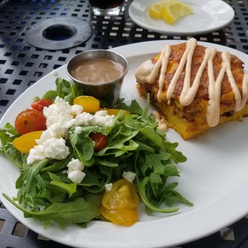 Otto's - Breakfast casserole with side salad. Dressing is strong, and the aioli on the casserole is too heavy. Good consistency, a lot of food - Breakfast & Brunch Near Me - Covington, Kentucky