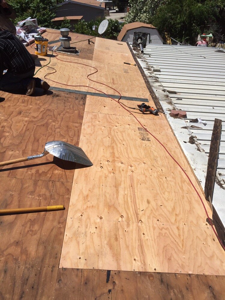 Slide of E & E Roofing