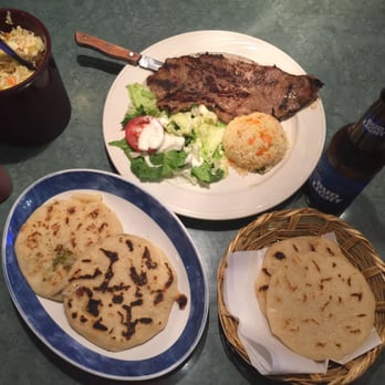 Cuscatlan Salvadorian Cuisine and More - Carne Asada Plate (center), calabaza queso pupusa, hongo pupusa (bottom left), tortillas. - Salvadoran Near Me - Escondido, California Cuscatlan Salvadorian Cuisine and More - Carne Asada Plate (center), calabaza queso pupusa, hongo pupusa (bottom left), tortillas. - Salvadoran Near Me - Escondido, California