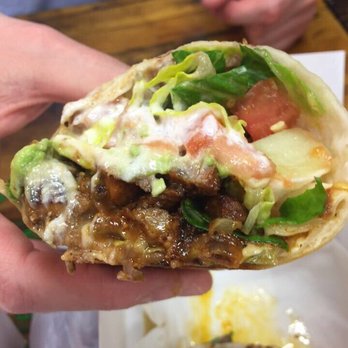 L' Patron Tacos - al pastor burrito. way too sweet. too much pineapple marinade - New Mexican Cuisine Near Me - Chicago, Illinois L' Patron Tacos - al pastor burrito. way too sweet. too much pineapple marinade - New Mexican Cuisine Near Me - Chicago, Illinois