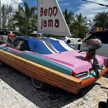 Jama Benn Jama - Decoration depicting the struggles of the Cuban people and transforming a car into a boat - Cuban Near Me - Hialeah Gardens, Florida