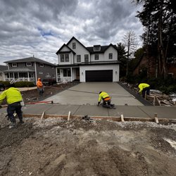 HV Construction - New Driveway put in with colored concrete borders.