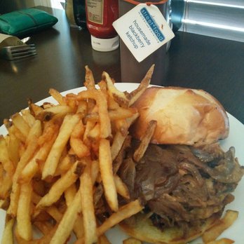 Okanagan - Pulled pork sandwich with a side of fries. - Breakfast & Brunch Near Me - Kelowna, British Columbia