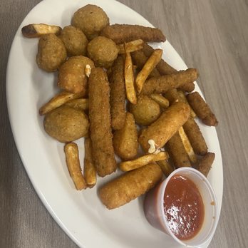 Sam's Kitchen - Appetizer platter with French fries, fried mushrooms, fried zucchini, and fried mozzarella sticks - Bakeries Near Me - Halifax, Virginia Sam's Kitchen - Appetizer platter with French fries, fried mushrooms, fried zucchini, and fried mozzarella sticks - Bakeries Near Me - Halifax, Virginia