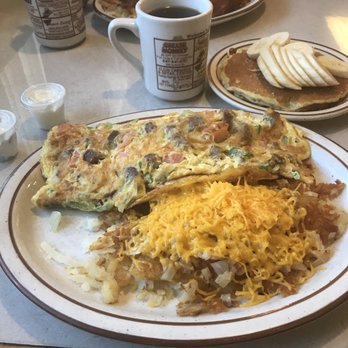 Ray's Diner - Gyro omelet with crunchy hash browns with onions and cheese and a side of banana pancakes!!!!! - Diners Near Me - Elgin, Illinois