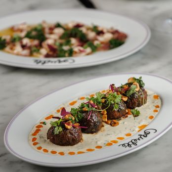 Coquette - Lamb Meatballs
caper crème fraiche, orange-date glaze, crushed hazelnuts, harissa chili oil - Breakfast & Brunch Near Me - Boston, Massachusetts
