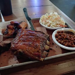 This was the three meat platter with brisket fried pork belly and ribs with beans and coleslaw as a side. This was the three meat platter with brisket fried pork belly and ribs with beans and coleslaw as a side.