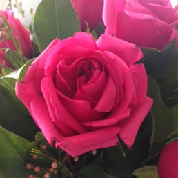 Valentine's Day roses immediately after delivery. That right there is a rose ABOUT TO DIE. Terrible quality.