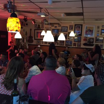 El Divino Restaurant - a large group of people sitting at tables - Karaoke Near Me - Miami, Florida El Divino Restaurant - a large group of people sitting at tables - Karaoke Near Me - Miami, Florida