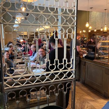 Medina Cafe - Inside by host station - Breakfast & Brunch Near Me - Vancouver, British Columbia