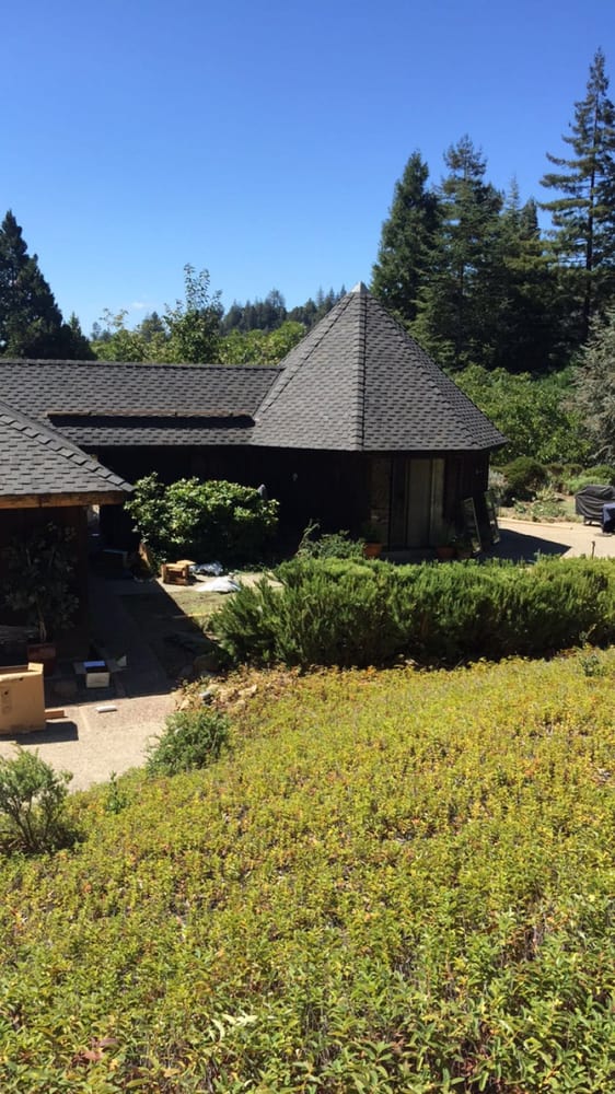 Slide of Landmark Roofing