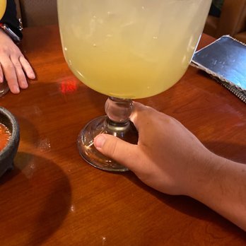 El Rodeo No 9 - a person holding a margarita - Mexican Near Me - Mooresville, Indiana