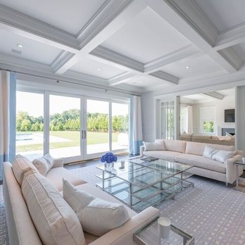 Sybelle Carpet - a large living room with white furniture - Carpeting Near Me - Southampton, New York Sybelle Carpet - a large living room with white furniture - Carpeting Near Me - Southampton, New York
