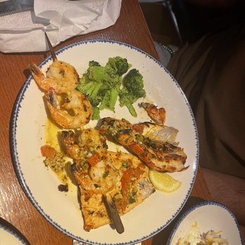 Red Lobster - a plate of food on a table - Seafood Near Me - Fargo, North Dakota