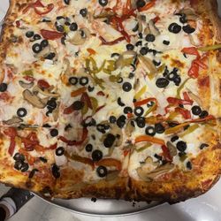 Trinacria - Sicilian pizza with olives, peppers , banana peppers topped with fresh mozzarella cheese
