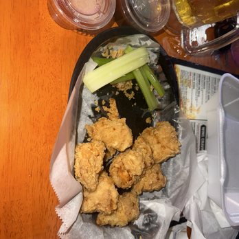 Tabby's Bar and Grill - Boneless wings with hot sauce and barbecue sauce on the side. - Sports Bars Near Me - Lake Placid, Florida Tabby's Bar and Grill - Boneless wings with hot sauce and barbecue sauce on the side. - Sports Bars Near Me - Lake Placid, Florida