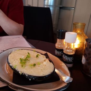 Moonshine Grill - Melt in your mouth green chile grits, my favorite! - Southern Near Me - Austin, Texas