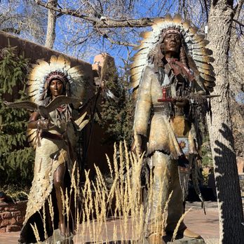Manitou Galleries - "She Walks in Beauty" and "Red Cloud-Broken Promises" by Ed Natiya - Art Galleries Near Me - Santa Fe, New Mexico