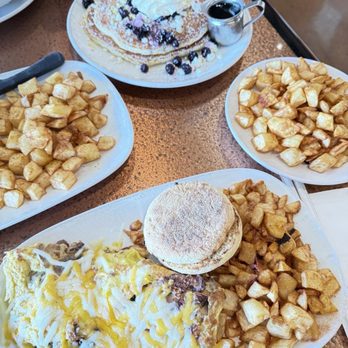 Another Broken Egg Cafe - Omelette with a side of potatoes,  2 stack blueberry pancake with goat cheese and a side of potatoes - Breakfast & Brunch Near Me - Burbank, California
