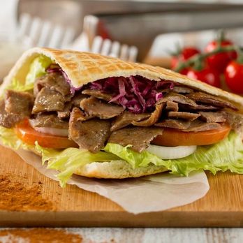 Donair Station - a beef sandwich on a cutting board - Mediterranean Near Me - Edmonton, Alberta