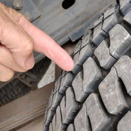 My finger sitting on top of the high ridge and the other side is worn down real hard and like I said these were brand new tires ! My finger sitting on top of the high ridge and the other side is worn down real hard and like I said these were brand new tires !