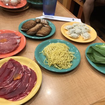 Nabeya Maido - The spread! There's only 4pieces of meat on each of those plates - Japanese Near Me - Honolulu, Hawaii