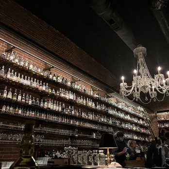 Multnomah Whiskey Library - a chandelier hanging from the ceiling - Lounges Near Me - Portland, Oregon Multnomah Whiskey Library - a chandelier hanging from the ceiling - Lounges Near Me - Portland, Oregon